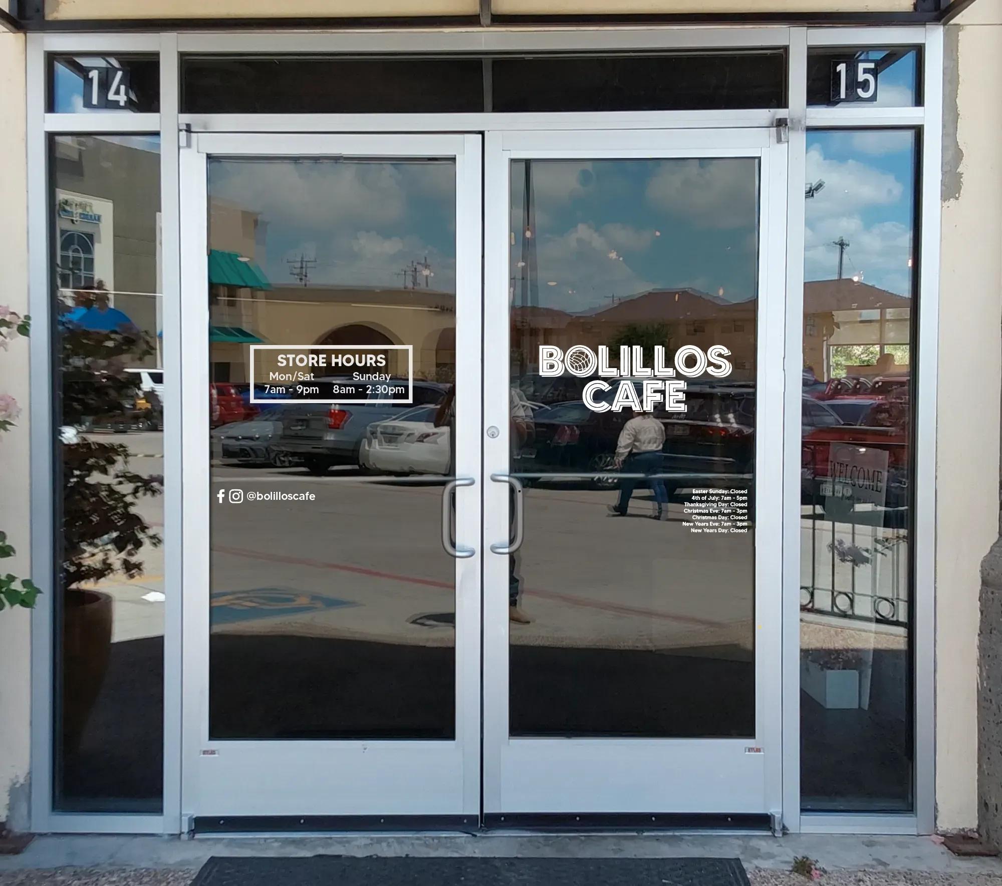 Bolillos Café entrance door graphics with logo and business hours
